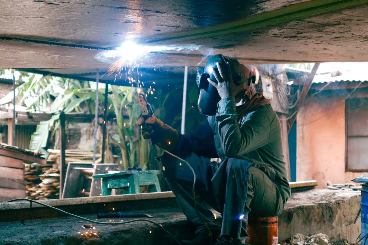 A welder working with sparks flying